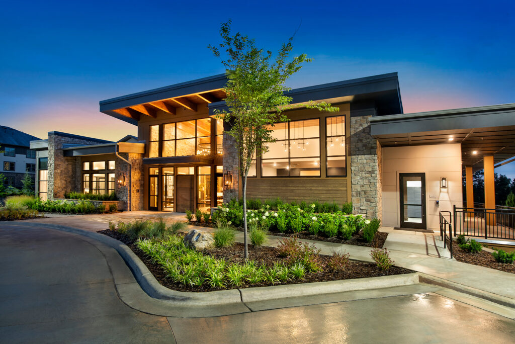 Clubhouse exterior at sunset at Town Triangle Crossing luxury apartments Raleigh NC